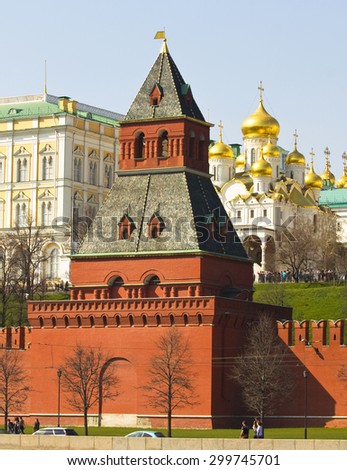 MOSCOW - APRIL 20, 2014: Tayninskaya tower of fortress Moscow Kremlin and Annunciation cathedral, built in 15 century.