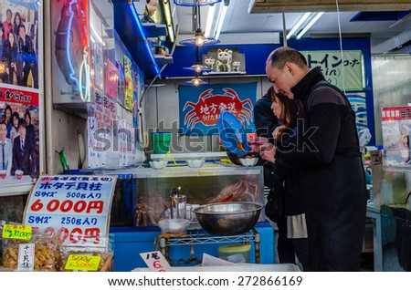 SAPPORO,JAPAN - 5 May 2014: Nijo market have many shops that sell fresh local produce and seafood such as crabs, salmon eggs, sea urchin and various fresh and prepared fish.