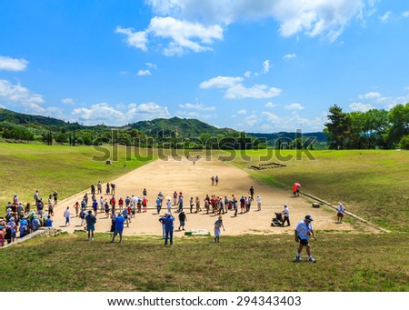 OLIMPIA, GREECE - JUNE 10: Many tourists visiting The ancient Olympia; the birth place of Olympic games on June 10, 2015 in Olympia, Greece.