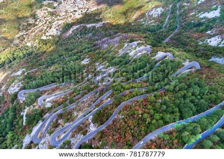 Similar – Image, Stock Photo Old serpentine road in the high alps