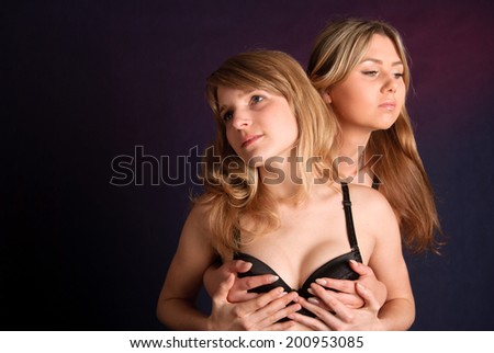 Two young and beautiful women together