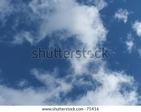 I thought that this was a neat view of the fast moving white puffy clouds
