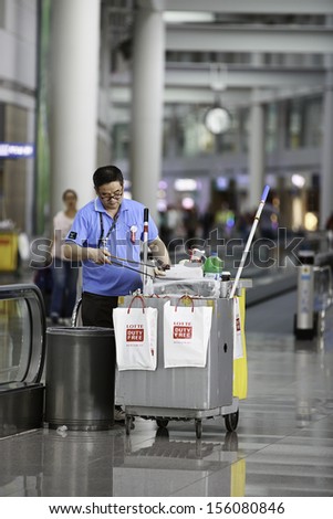 INCHEON, SOUTH KOREA - MAY, 29: Janitor working at Incheon International Airport on May 29, 2013 in South Korea. Incheon International Airport is the largest airport in South Korea.