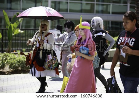 ANAHEIM, CA - MARCH 30: Group of people dressing up in costumes on March 30, 2013 in Anaheim Convention Center, CA. The Anaheim Convention Center is a major convention center in Anaheim, CA