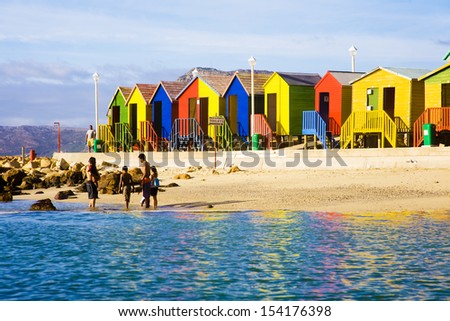 CAPE TOWN, SOUTH AFRICA - DECEMBER 19: Swimmers enjoying famous St James Beach and tidal pool on December 19, 2009 in Cape Town, South Africa