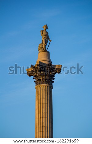Nelsons column with the warm light of sunset on the side