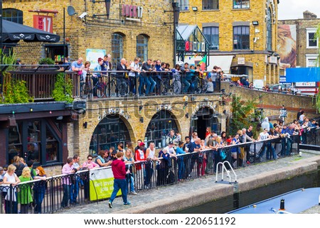 LONDON, UK - 27TH SEPTEMBER 2014: Lots of people along the lake at Camden Lock during the day