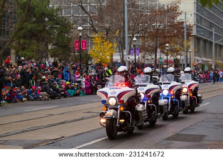 TORONTO, CANADA - 16TH NOVEMBER 2014: Toronto Police taking part in the Santa Claus Parade in Toronto