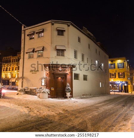 TORONTO, CANADA - 22ND FEBRUARY 2015: The outside of Tom Jones Steak House at night in downtown Toronto