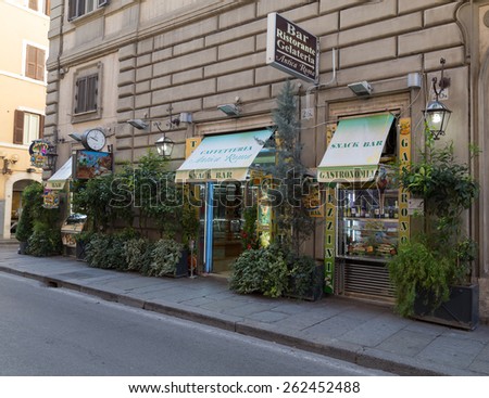 ROME, ITALY - 12TH MARCH 2015: The outside of a Snack Bar in Rome during the day. Plants can be seen outside