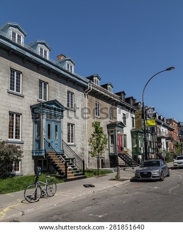 MONTREAL, CANADA - 17TH MAY 2015: Streets in Montreal during the day showing the buildings and style