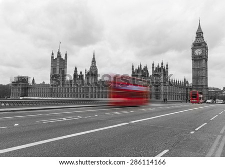 A colormix of Westminster showing bright red buses on a black and white image of Westminster.