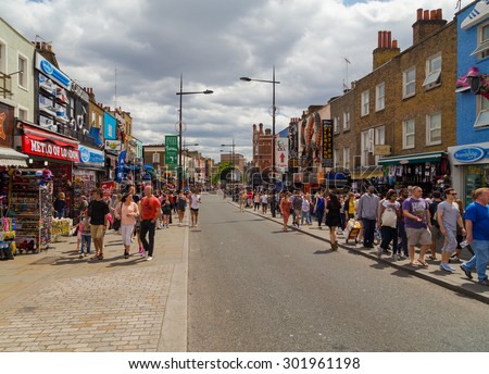 LONDON, UK - 19TH JULY 2015: Large amounts of people along Camden High Street during the day on a weekend