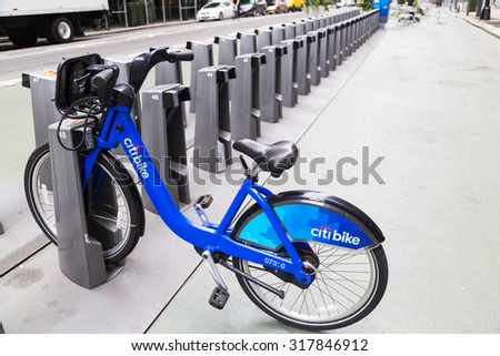 NEW YORK CITY, USA - AUGUST 31, 2015: A single New York Citi Bike at a docking stand in the morning.