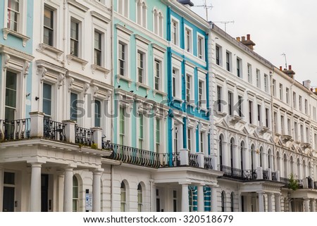 LONDON, UK - 16TH JULY 2015: The outside of old Townhouse in Notting Hill, London during the day.