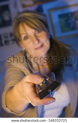 mature woman with remote control
