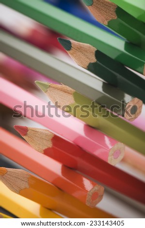 cross-stacked colored pencils near