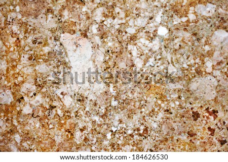 Bright yellow natural marble . Beautiful multi-colored interior decorative stone marble abstract cracks and stains on the surface.