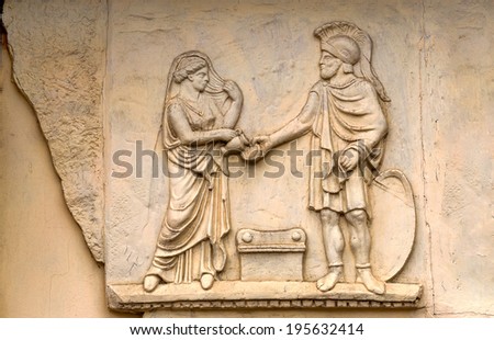stone facade fresco decoration scenes from ancient Greek myths