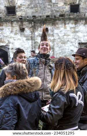 Odessa, Ukraine - November 22: Stylized clothing and hairstyle punk rock band fan party before a rock concert circuit and metal ornaments, November 22, 2014 in Odessa, Ukraine