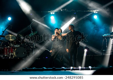 ODESSA, UKRAINE - 20 June 2014: in a nightclub at a concert during the creative light and music show. stage smoke on a club party. Singer Tina Karol Ukraine and her jazz band