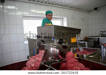 Odessa, Ukraine - July 7, 2007: The factory for the production of food from natural Ingredients. Food Convenience food. Production of dumplings, pancakes. Butcher shop. Butchering beef.