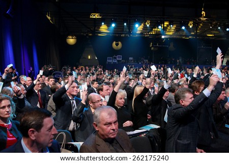 KIEV, UKRAINE - March 29, 2014: General view of the hall at the Congress prohibited the Party of Regions of Ukraine. Voting for the election. Last exit before the prohibition and dissolution