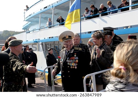 ODESSA, UKRAINE - 6 October 2010: Ship friendship Marschal Koshevoy with World War II veterans came to the sea port of Odessa. Honoring deserving war heroes