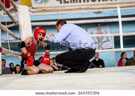 Odessa, Ukraine, April 26, 2015: Cup of Ukraine. Thai boxing among children. Kids boxing, kickboxing children. Children fight with these adult emotions. Popularization of sports and healthy lifestyle