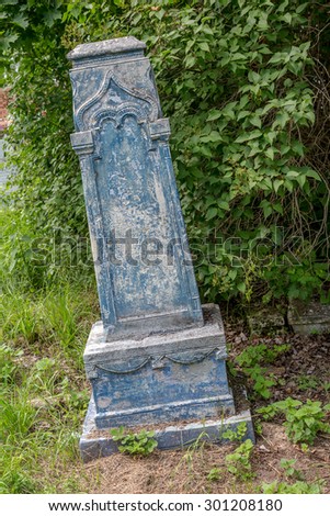 KASIMOV, Ryazan, RUSSIA - July 18, 2015: Tombstones in a very old provincial abandoned cemetery, more than 200 years. Unusual shaped crosses and tombstones. Cemetery conservatives. Ryazan region