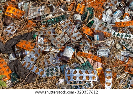 Odessa, Ukraine - September 12, 2015: A secret place of reception of narcotics addicts in an abandoned train station. Scattered empty packages of drugs and syringes in place of gathering of addicts.