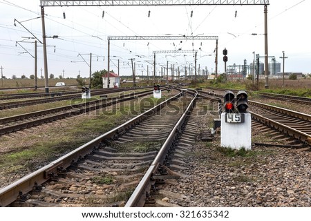 Odessa, Ukraine - September 28 2015: The movement of freight trains on the Ukrainian railways. railway interchange. Signs on the railway. Railway traffic lights. Change the way.