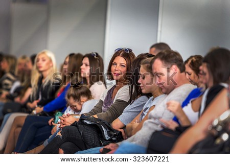Odessa, Ukraine, October 3, 2015: The audience during a women\'s fashion show at Fashion Week in Odessa OFD. New Collection - 2015 Festival of fashion. Vybrochny focus. Emotional fans of the show