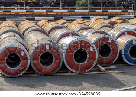 Odessa, Ukraine - 6 October 2015: cold rolled steel coils a metal strip accumulate in marine cargo port ready for shipment. Rolls, coil steel sheet rolled metal