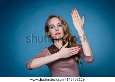 beautiful young girl with hands like puppets
