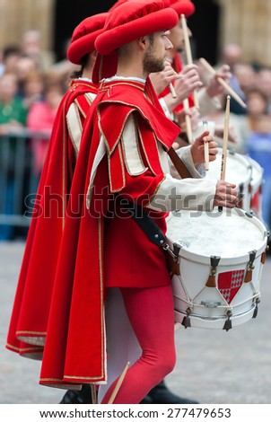 Asti, Italy - September 19, 2010: the historic Medieval parade of the Palio of Asti in Piedmont, Italy. Drummer in medieval reenactment costumes