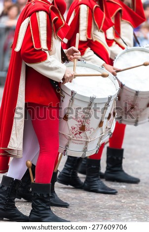 historic Medieval parade of the Palio of Asti in Piedmont, Italy. Drummer in medieval reenactment costumes