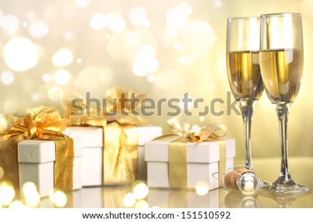 Champagne glasses and gifts ready to bring in the new year
