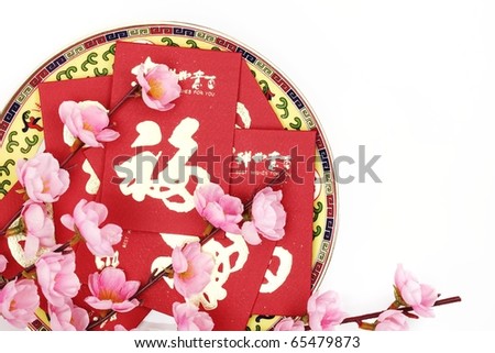 Chinese new year ornaments--Plum blossom and red packets,Character on Packets Symbolizes Luck.