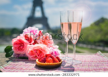Wine glasses and Eiffel tower in Paris in spring