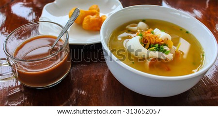 Porridge with seafood and coffee