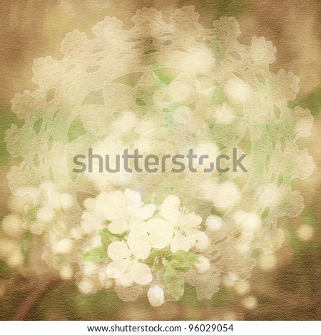 Designed grungy paper background with floral motifs