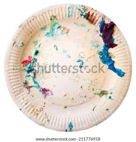 Paper plate with remains of French fries, ketchup and an old chewing gum, Berlin