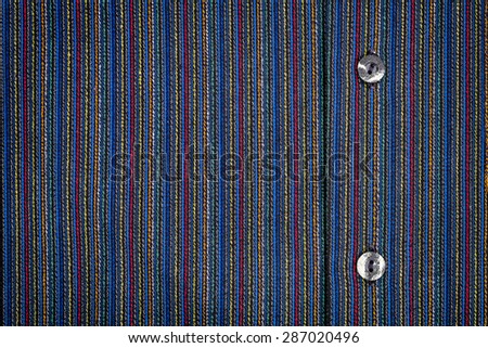 Lined fabric texture with buttons background