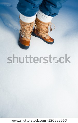 winter shoes in snow, close-up
