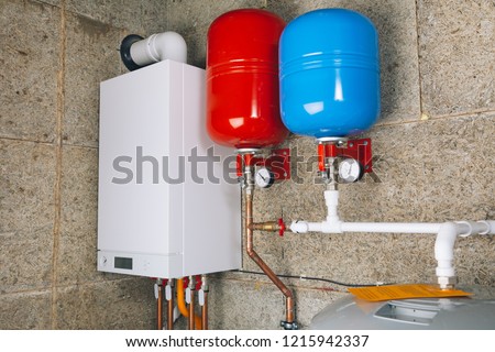 Similar – Image, Stock Photo Water heater or boiler repair, with electrical wires and pipes in the bathroom. close-up.