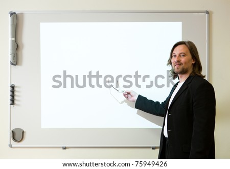 man making a presentation with empty projector screen