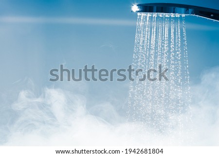 shower with flowing water and steam