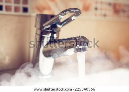 water tap with hot water steam