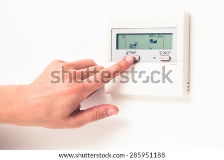 digital climate thermostat controlling by hand